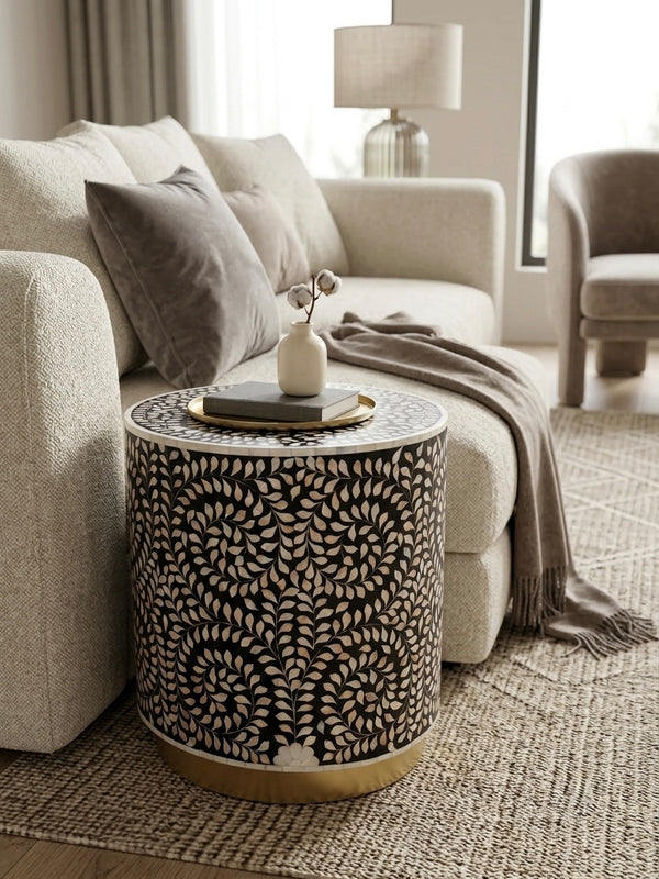Black and white Mother of Pearl inlay round side table with floral design and brass-tone base