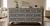 Black Mother of Pearl inlay 7 drawer chest of drawers with handcrafted floral design